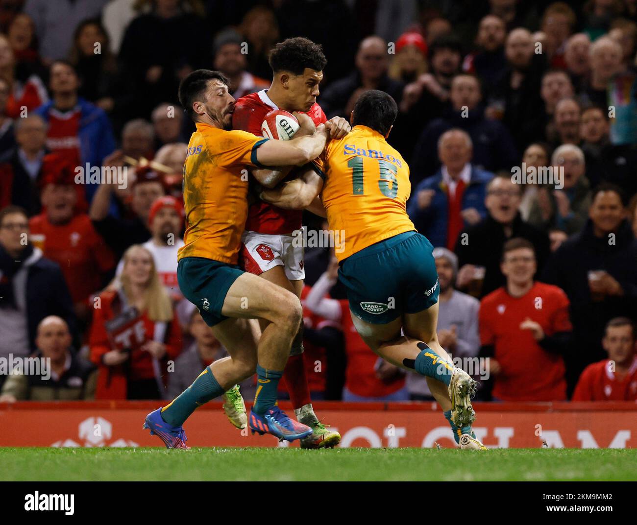 Rugby Union - International - Wales v Australia - Principality Stadium, Cardiff, Wales, Britain - November 26, 2022 Wales' Rio Dyer in action with Australia's Jake Gordon and Tom Wright Action Images via Reuters/Andrew Couldridge Stock Photo