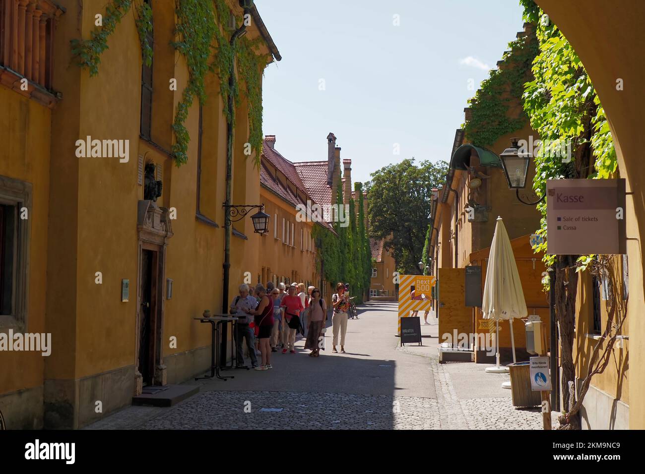 entrance to the Fuggerei, 16th century public housing complex , oldest