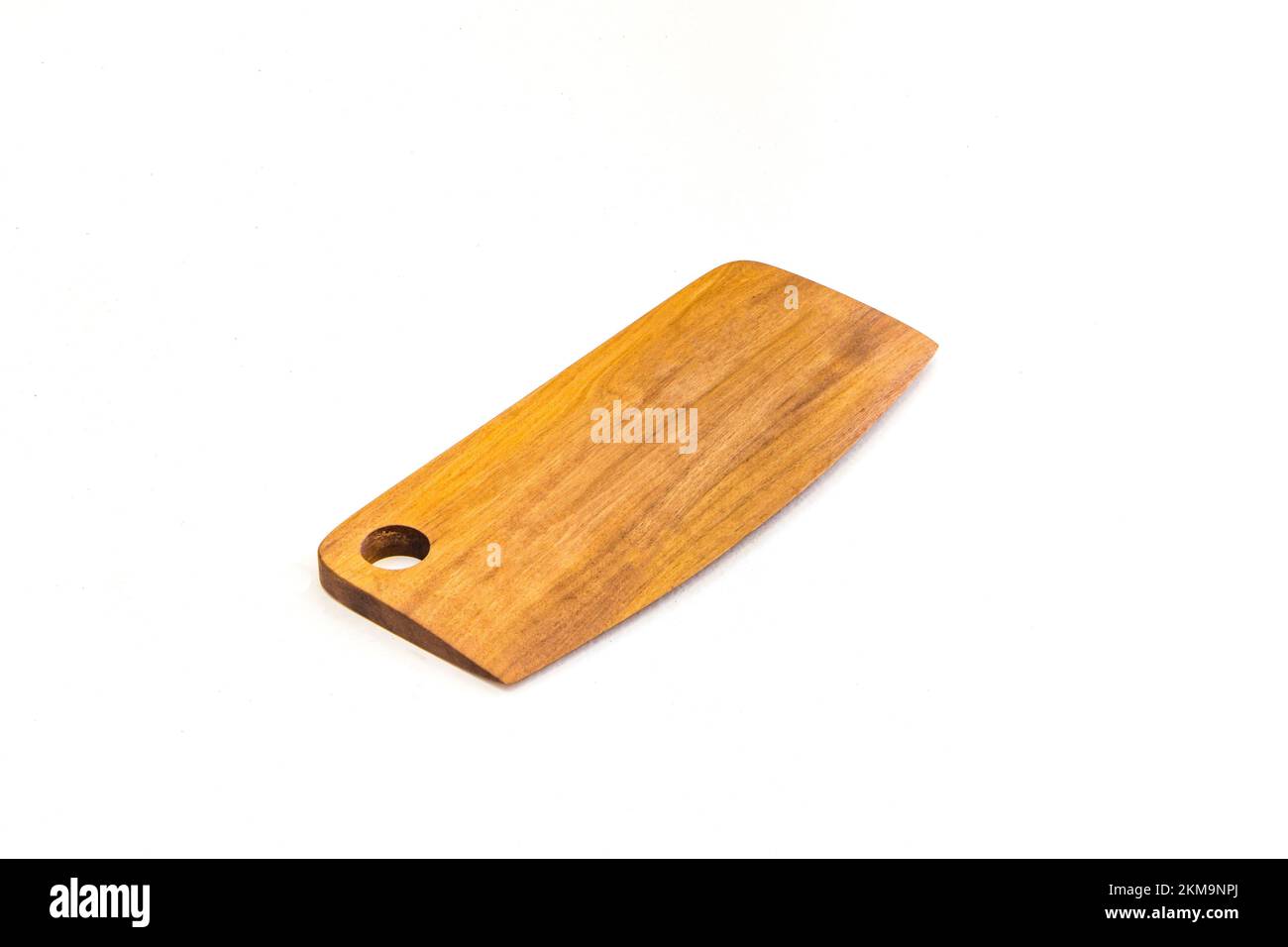A closeup of fab slabs natural wood camphor laurel cutting board
