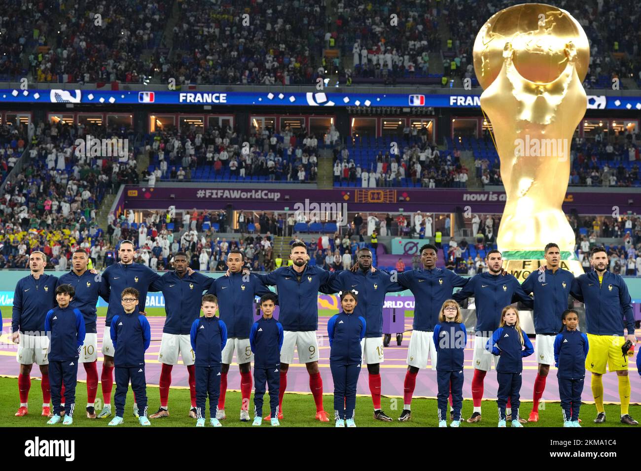 France's Antoine Griezmann (left) lines up with his team-mates prior to kick-off of the FIFA World Cup Group D match at Stadium 974 in Doha, Qatar. Picture date: Saturday November 26, 2022. Stock Photo