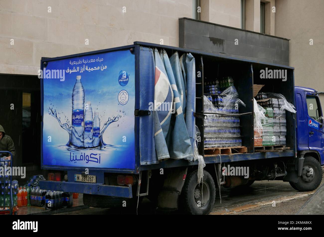 Beirut, Lebanon. 25th Nov, 2022. A truck delivers bottled water and