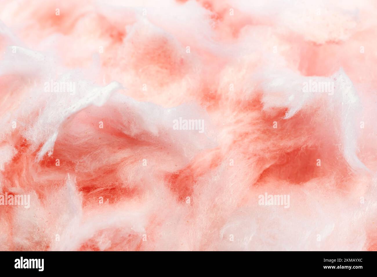Pink cotton candy background or texture with strawberry flavor. cotton