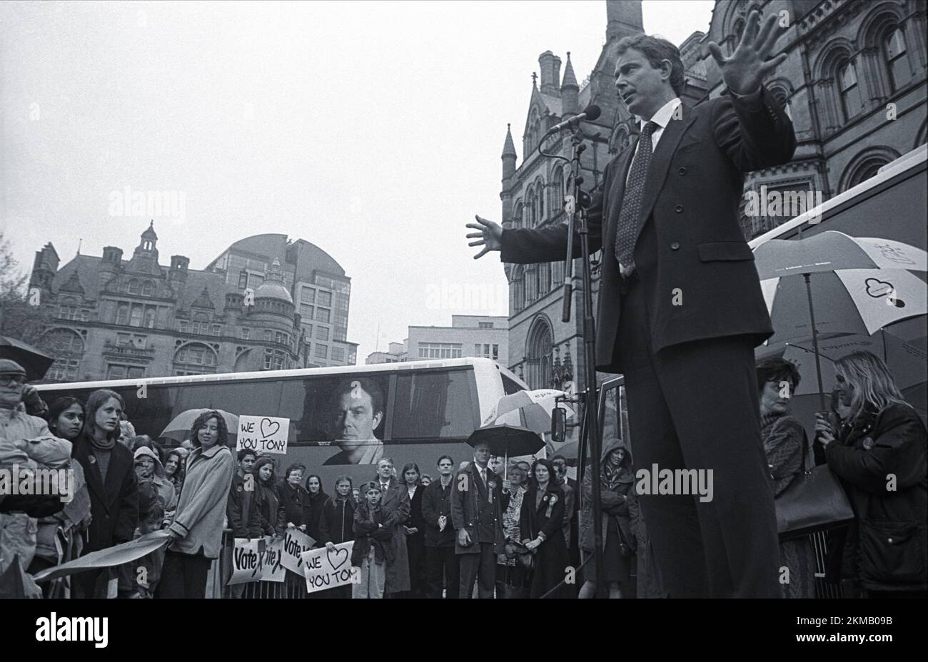 Tony Blair gives a speech to supporters in the rain, Manchester, 1997
