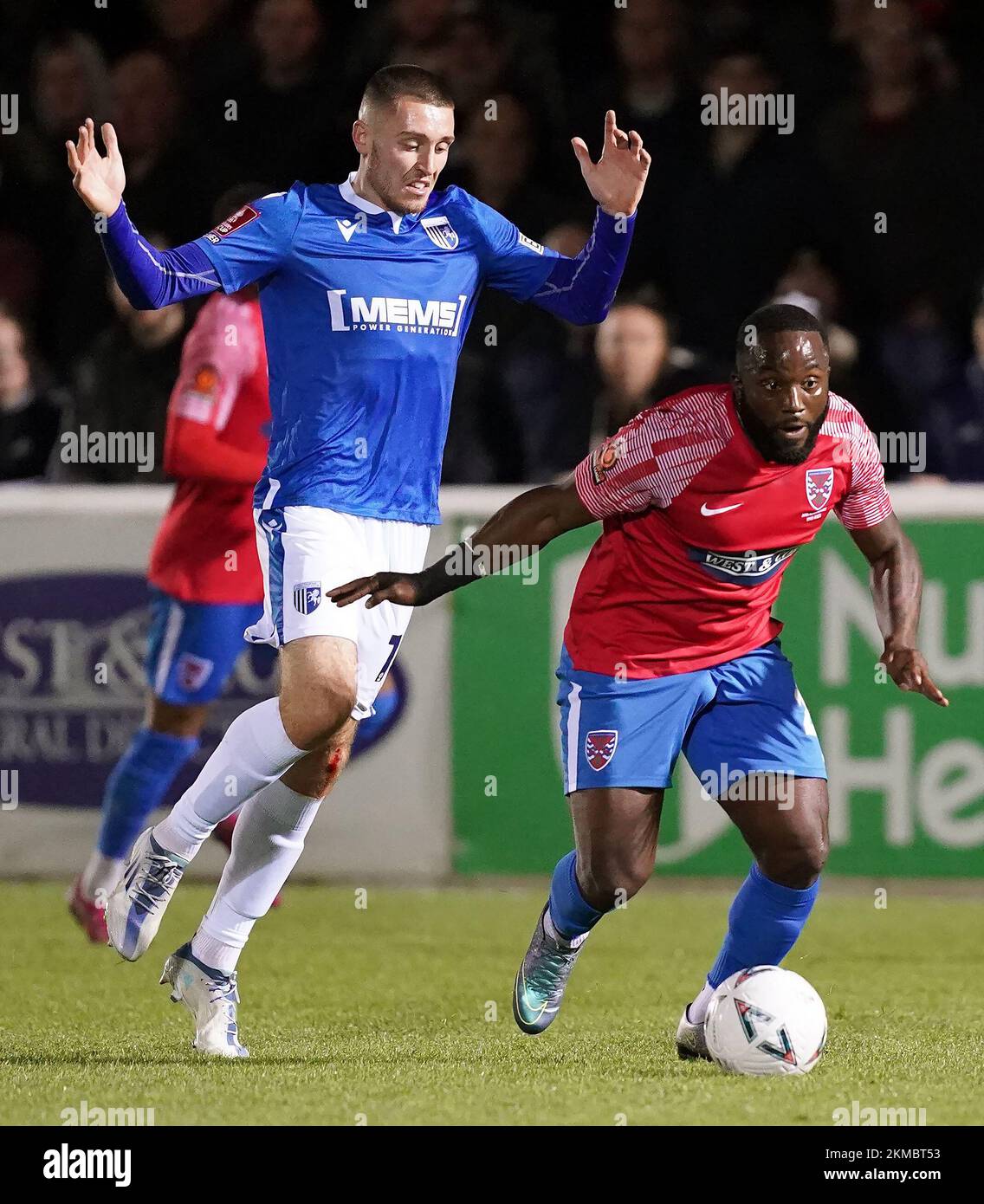 Gillingham's Dom Jefferies (left) and Dagenham and Redbridge's Junior