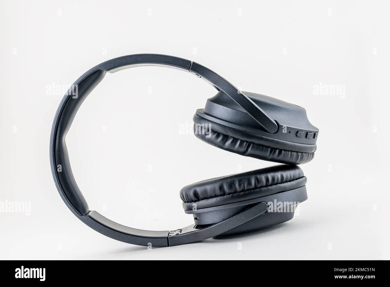 black headphones on white background Stock Photo Alamy