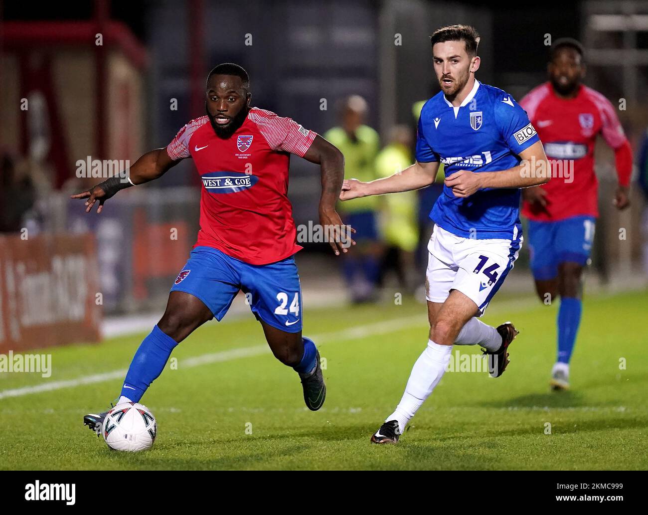 Dagenham and Redbridge's Junior Morias (left) and Gillingham's Robbie