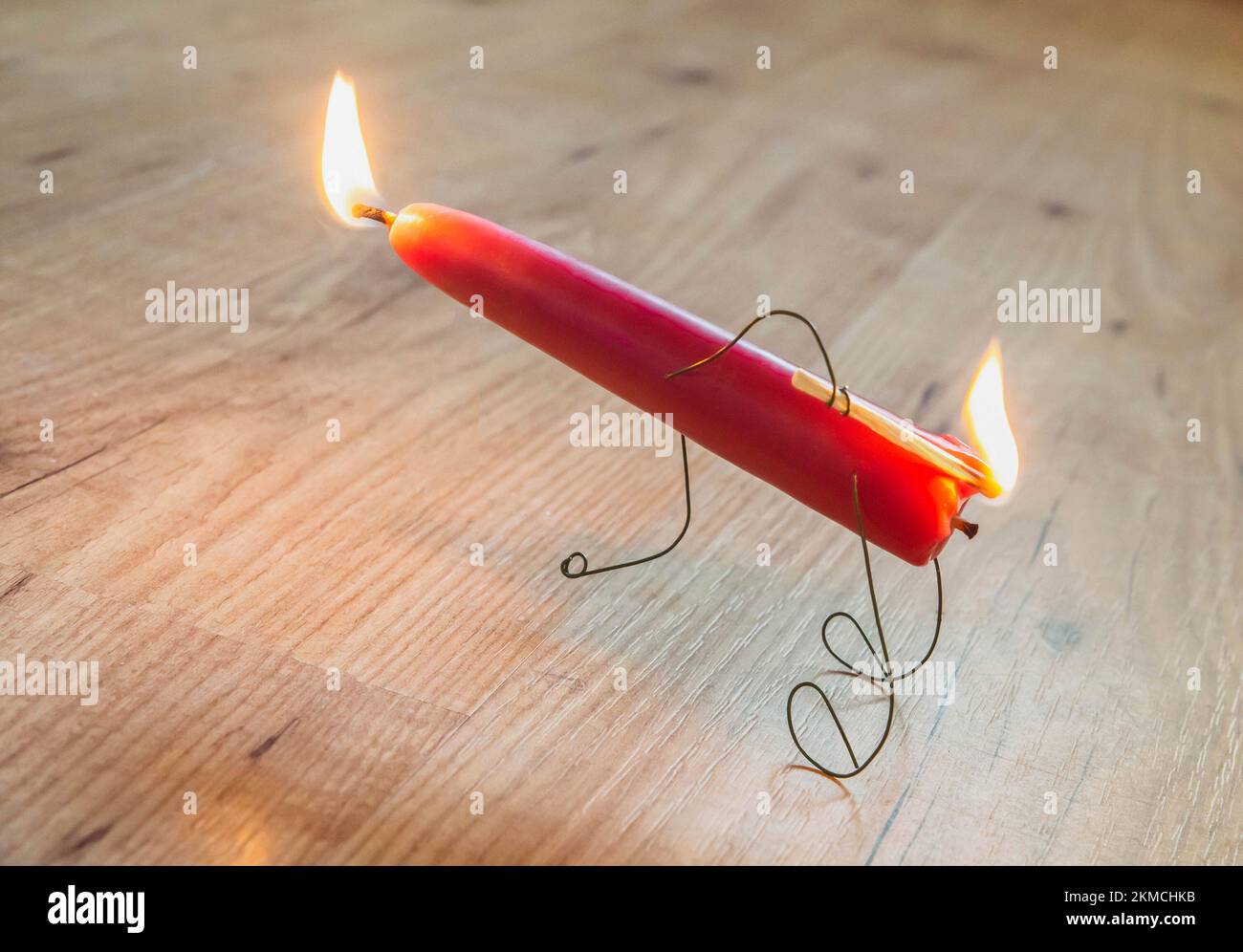 Funny candle wants to fly like a rocket Stock Photo