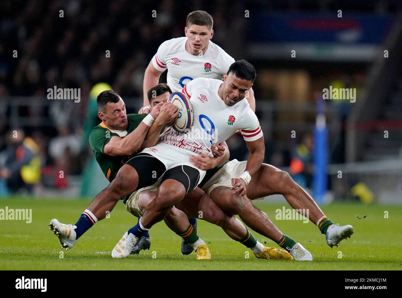 England's Manu Tuilagi (right) is tackled by South Africa's Jesse Kriel (left) during the Autumn International match at Twickenham Stadium, London. Picture date: Saturday November 26, 2022. Stock Photo