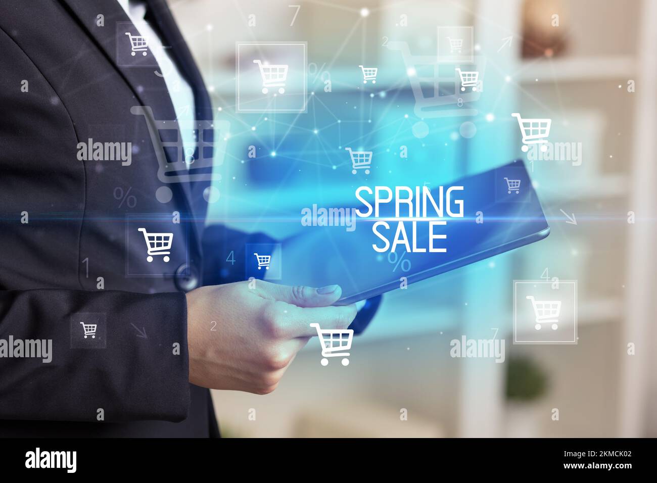 Young person makes a purchase through a tablet Stock Photo Alamy