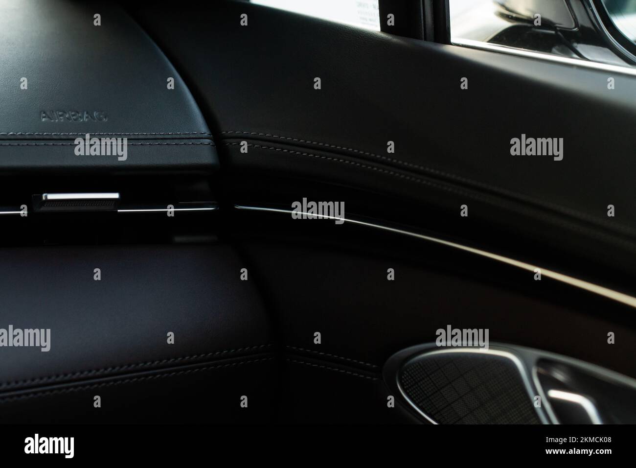 Modern car interior close up view with metallic and plastic details