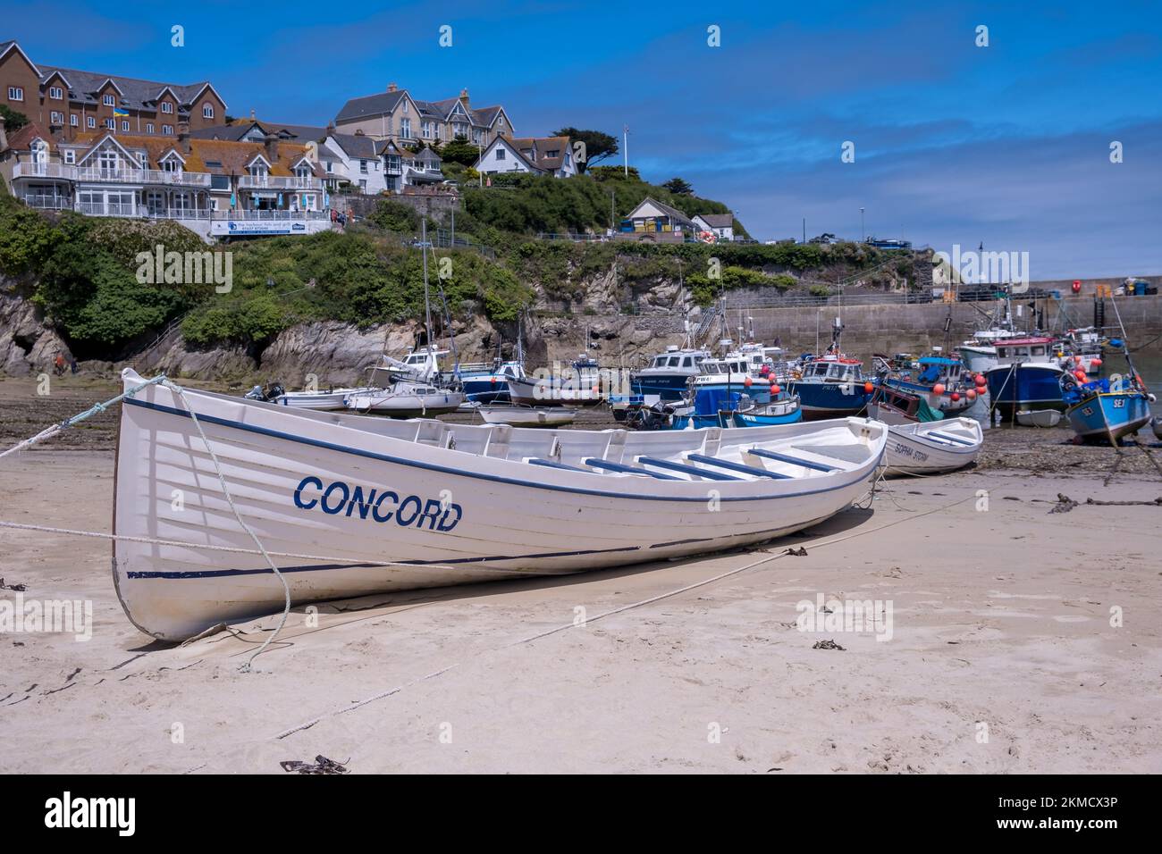 Newquay rowing boat named Concord in Newquay Harbour, Cornwall, UK Stock Photo