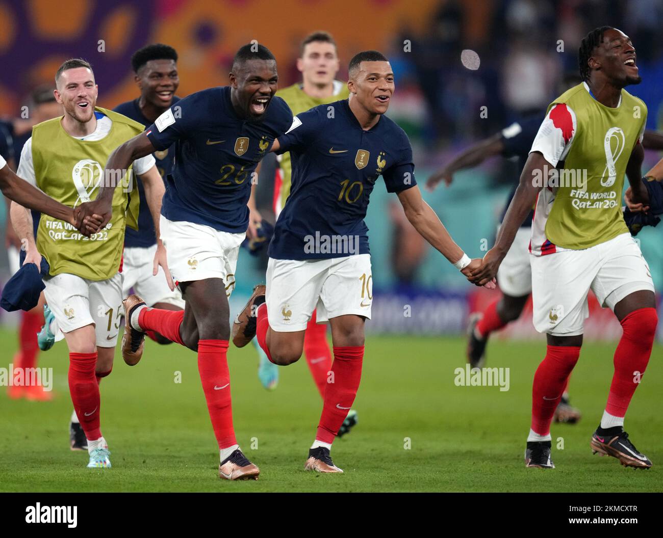 Left to right, France's Jordan Veretout, Kylian Mbappe, Marcus Thuram and Axel Disasi celebrate in front of their fans after the FIFA World Cup Group D match at Stadium 974 in Doha, Qatar. Picture date: Saturday November 26, 2022. Stock Photo