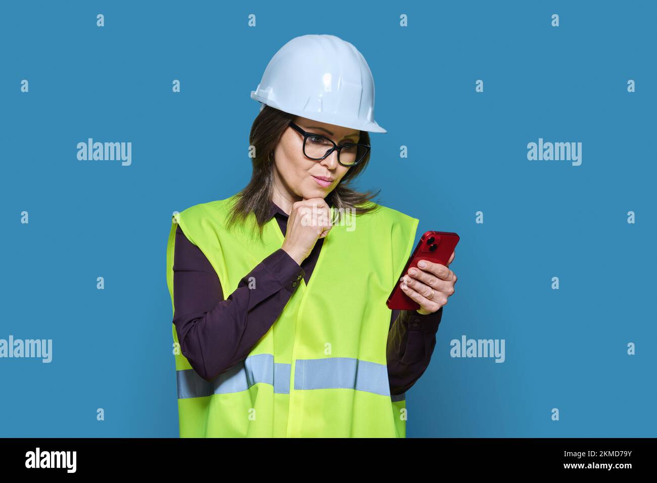 Engineer woman in yellow helmet hi-res stock photography and images - Alamy