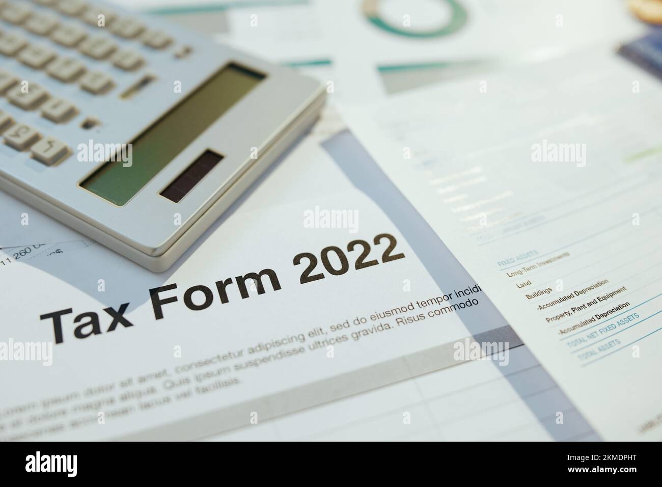 tax form 2022 and calculator at desk Stock Photo Alamy