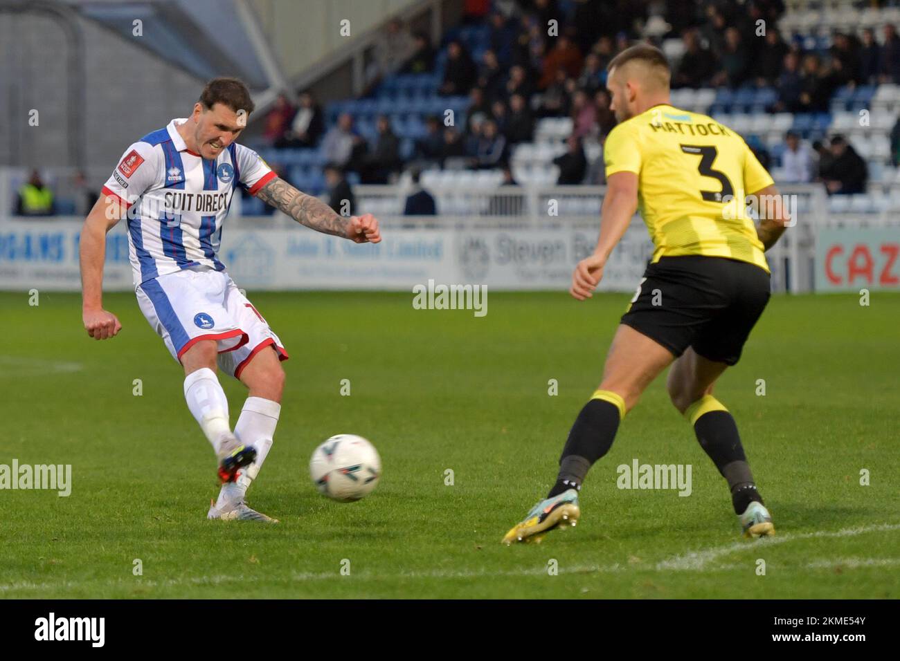 Hartlepool, UK. 19th Nov, 2022. Hartlepool United's Callum Cooke shots at goal only to see his shot go wide of the post during the FA Cup Second Round match between Hartlepool United and Harrogate Town at Victoria Park, Hartlepool on Saturday 26th November 2022. (Credit: Scott Llewellyn | MI News) Credit: MI News & Sport /Alamy Live News Stock Photo