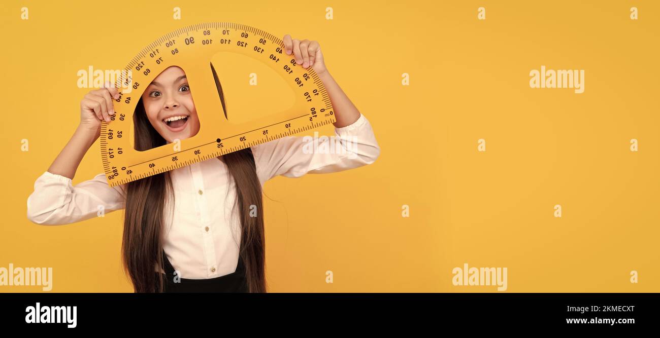 Student Using Protractor education for child. mathematics. cheerful teen girl hold protractor ...
