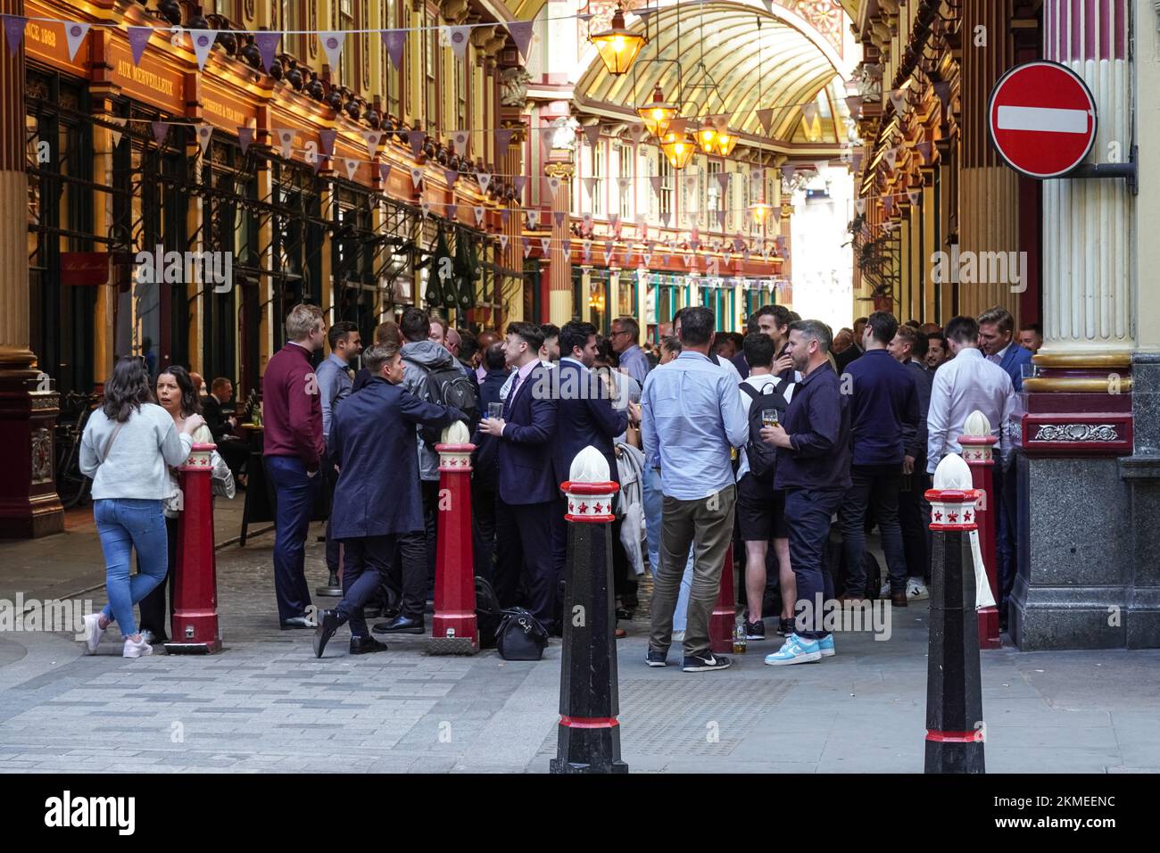 City workers drinking beer outside pub at Leadenhall Market in London, England, United Kingdom, UK Stock Photo
