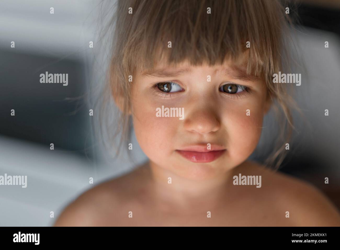 European girl is sad and offended. Sisters quarrel. Sad and sad child. High quality photo. Stock Photo