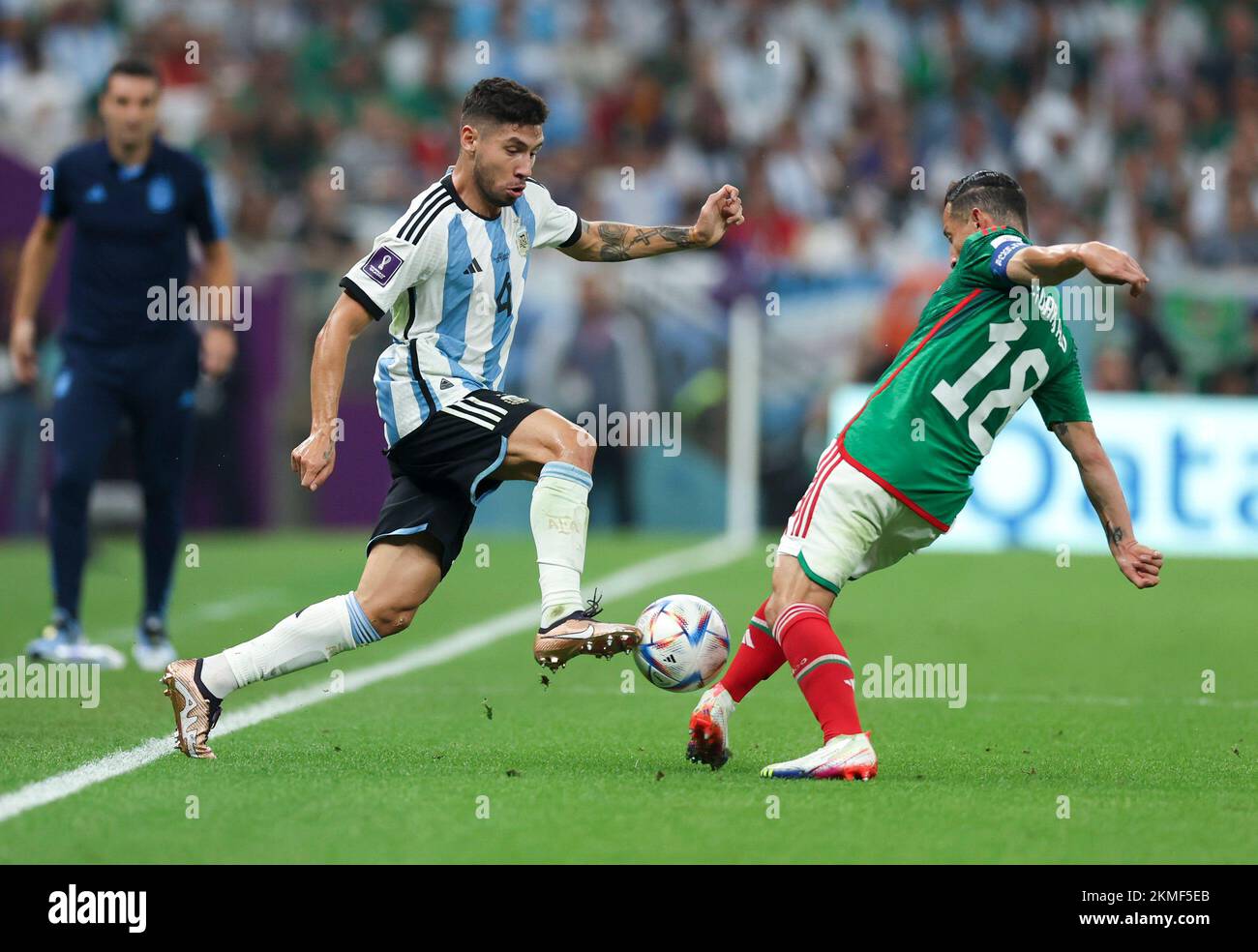 Lusail, Qatar. 26th Nov, 2022. Gonzalo Montiel (L) of Argentina vies with Andres Guardado of Mexico during the Group C match between Argentina and Mexico at the 2022 FIFA World Cup at Lusail Stadium in Lusail, Qatar, Nov. 26, 2022. Credit: Pan Yulong/Xinhua/Alamy Live News Stock Photo