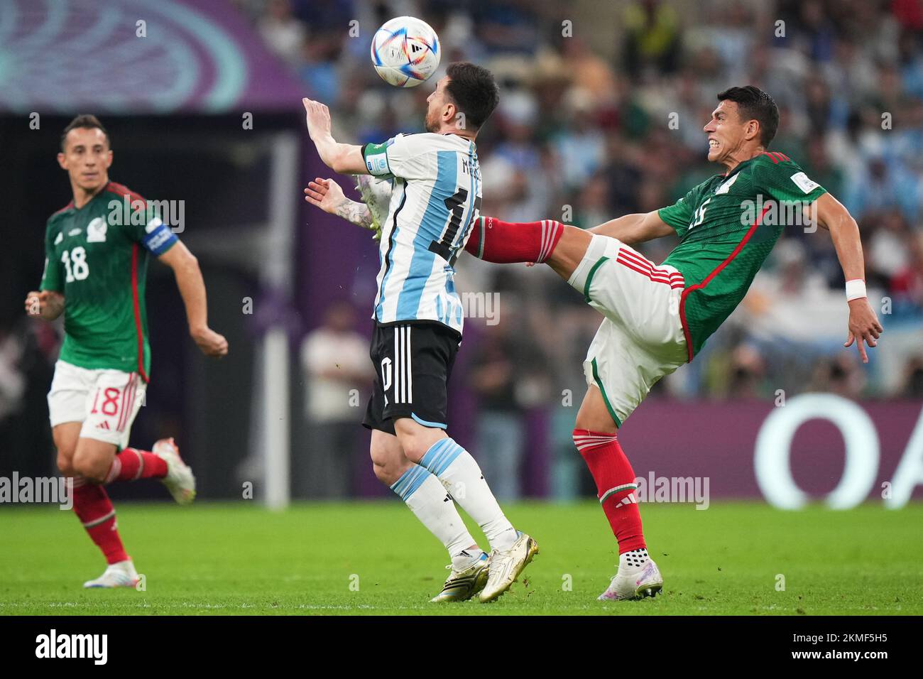 Lionel Messi of Argentina and Hector Moreno of Mexico during the FIFA World Cup Qatar 2022 match, Group C, between Argentina and Mexico played at Lusail Stadium on Nov 26, 2022 in Lusail, Qatar. (Photo by Bagu Blanco / PRESSIN) Credit: PRESSINPHOTO SPORTS AGENCY/Alamy Live News Stock Photo