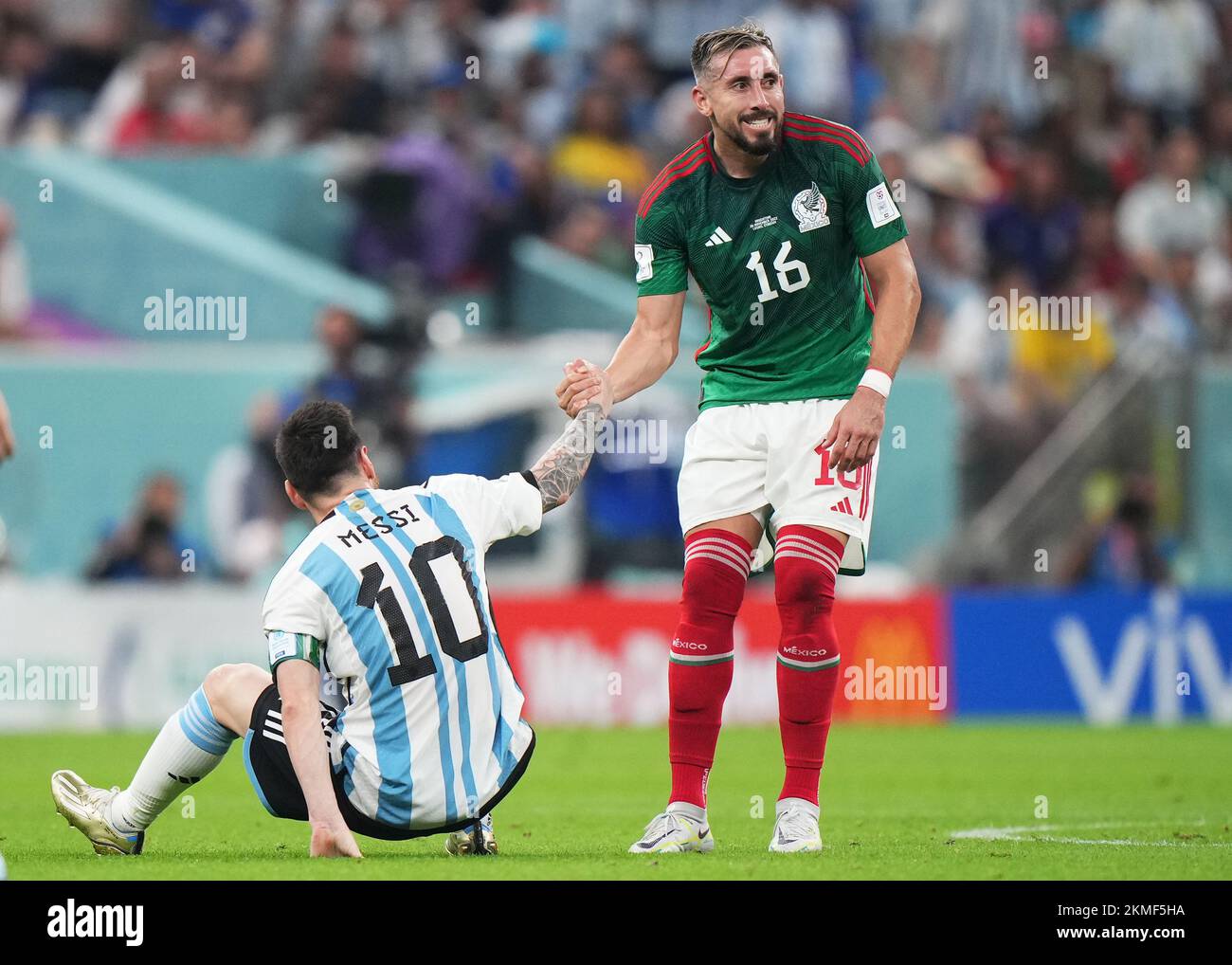 Lionel Messi of Argentina and Hector Herrera of Mexico during the FIFA World Cup Qatar 2022 match, Group C, between Argentina and Mexico played at Lusail Stadium on Nov 26, 2022 in Lusail, Qatar. (Photo by Bagu Blanco / PRESSIN) Credit: PRESSINPHOTO SPORTS AGENCY/Alamy Live News Stock Photo