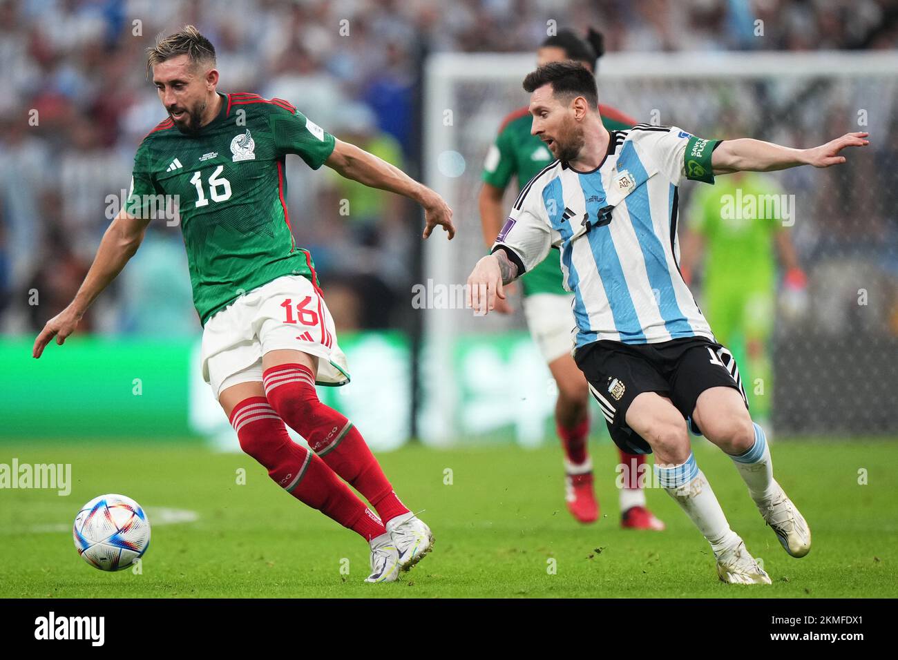 Hector Herrera of Mexico and Lionel Messi of Argentina during the FIFA World Cup Qatar 2022 match, Group C, between Argentina and Mexico played at Lusail Stadium on Nov 26, 2022 in Lusail, Qatar. (Photo by Bagu Blanco / PRESSIN) Credit: PRESSINPHOTO SPORTS AGENCY/Alamy Live News Stock Photo