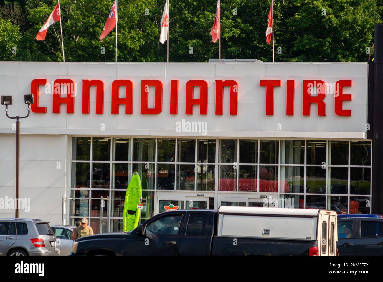 Canadian Tire storefront sign. The company is a retailer of automotive