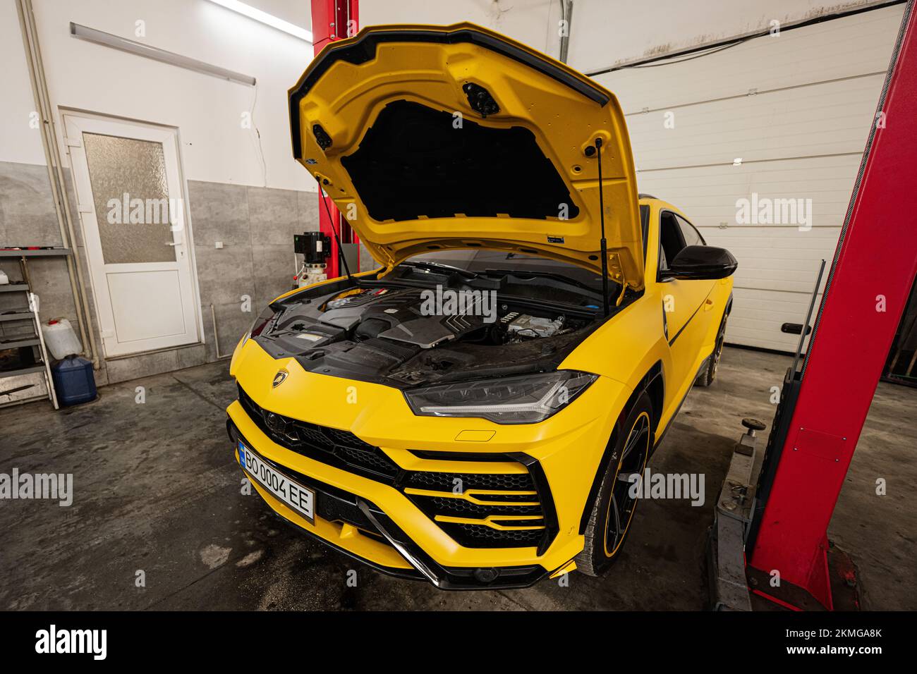 Ternopil, Ukraine November 11, 2022 Yellow Urus with open