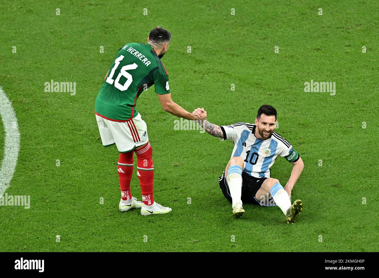 Lusail, Qatar. 26th Nov, 2022. Hector Herrera of Mexico shakes with Lionel Messi of Argentina during the Group C match between Argentina and Mexico at the 2022 FIFA World Cup at Lusail Stadium in Lusail, Qatar, Nov. 26, 2022. Credit: Xin Yuewei/Xinhua/Alamy Live News Stock Photo