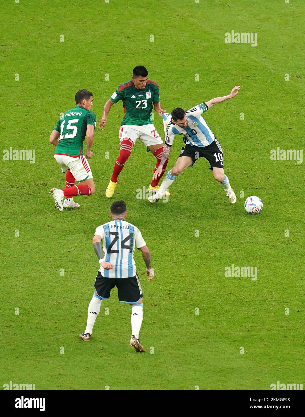 Mexico's Hector Moreno, Jesus Gallardo and Argentina's Lionel Messi (left-right) battle for the ball during the FIFA World Cup Group C match at the Lusail Stadium in Lusail, Qatar. Picture date: Saturday November 26, 2022. Stock Photo