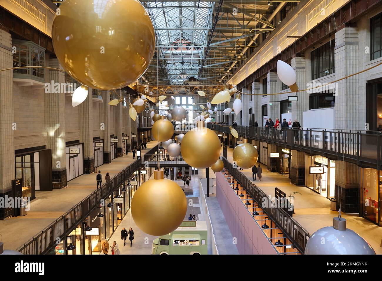 Turbine Hall A in the reopened Battersea Power Station, with stylish Christmas baubles up, in SW London, UK Stock Photo