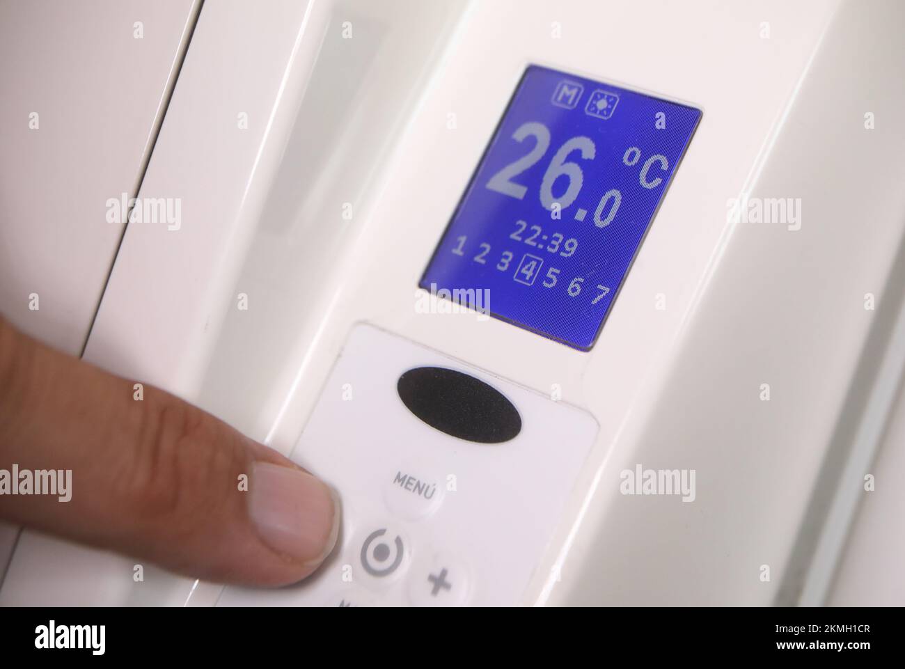 Turning temperatures down at home with the energy price hike, UK Stock Photo