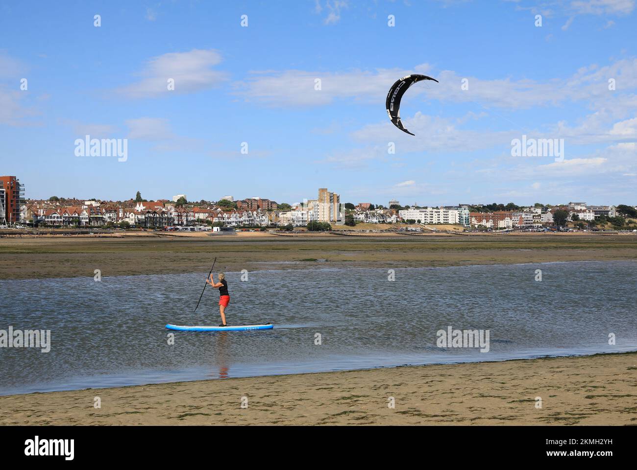 Kite surfing on the sandbanks at Chalkwell beach at low tide, in Southend-on-sea, Essex, UK Stock Photo