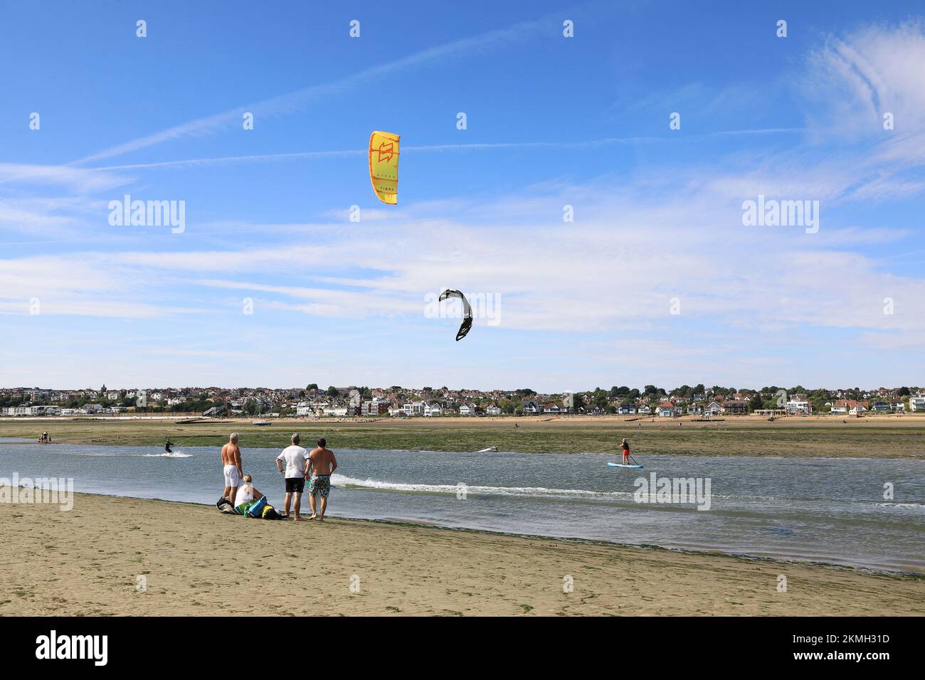 Kite surfing on the sandbanks at Chalkwell beach at low tide, in Southend-on-sea, Essex, UK Stock Photo