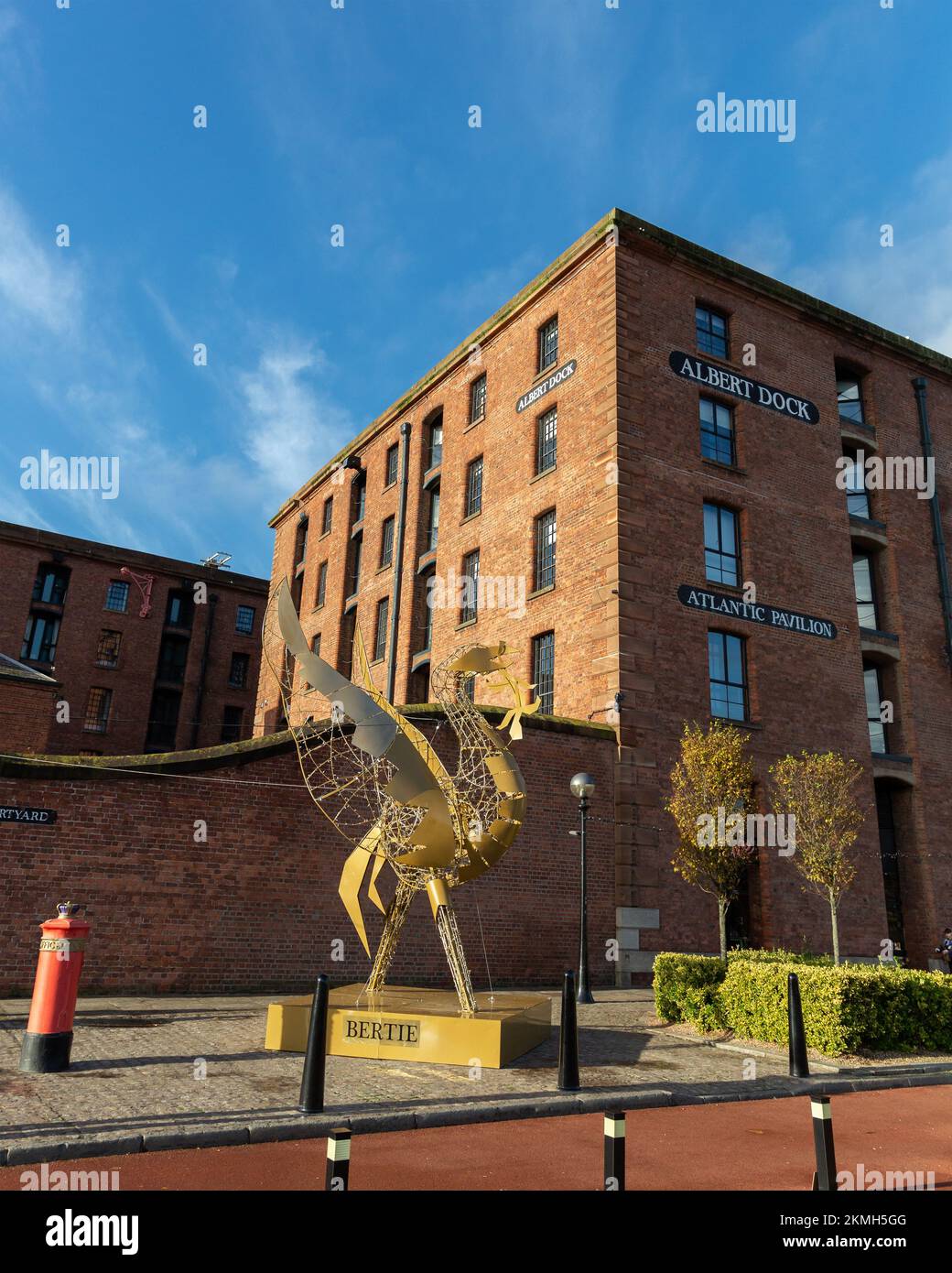 Liverpool, UK: Bertie the Liver Bird sculpture, part of the Christmas decorations, at the entrance to Royal Albert Dock Stock Photo