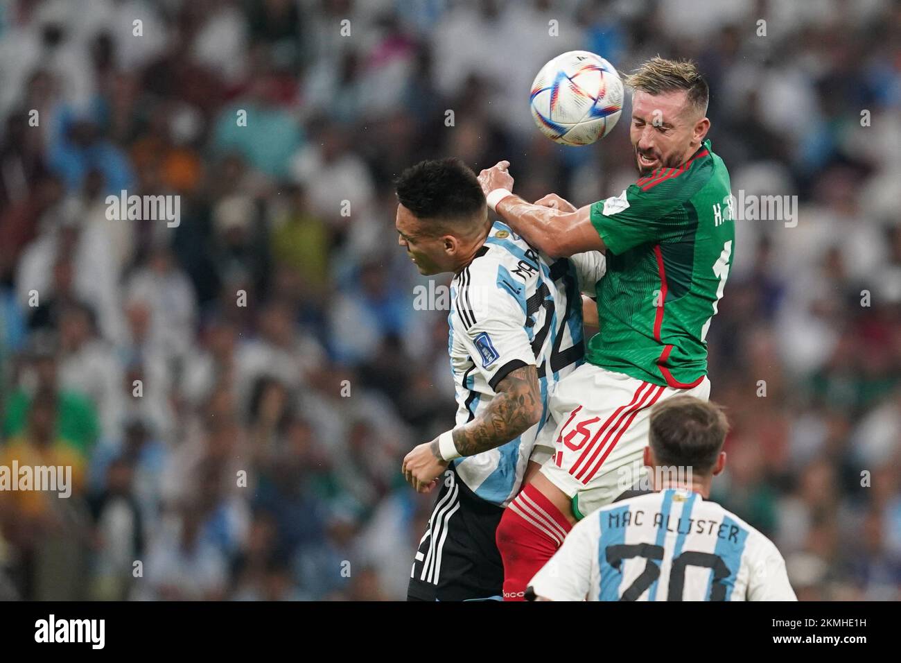 LUSAIL, QATAR - NOVEMBER 26: Player of Argentina Lautaro Martínez fights for the ball with player of Mexico Héctor Herrera during the FIFA World Cup Qatar 2022 group A match between Argentina and Mexico at Khalifa International Stadium on November 26, 2022 in Doha, Qatar. (Photo by Florencia Tan Jun/PxImages) Stock Photo
