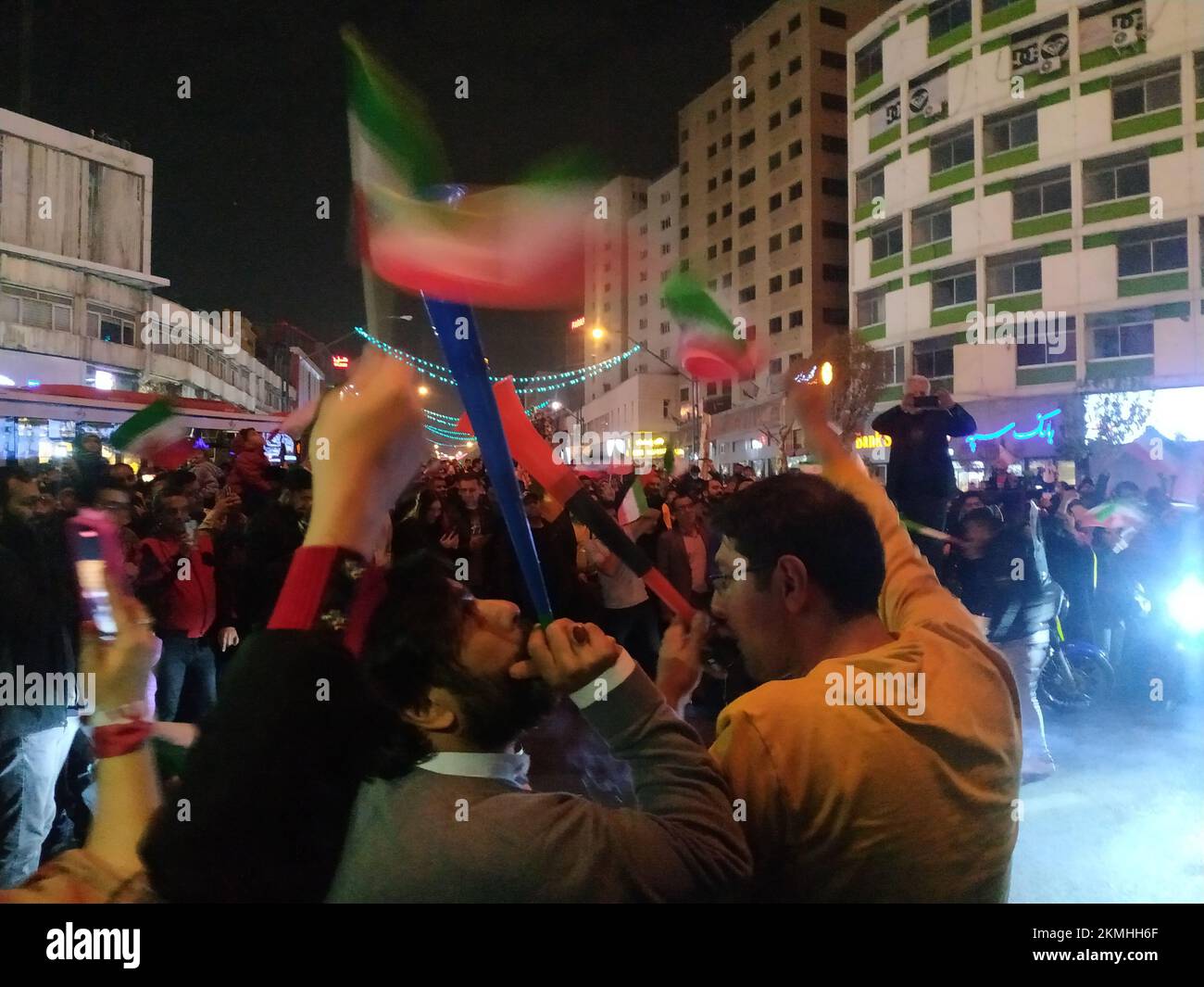 Tehran, Tehran, Iran. 25th Nov, 2022. Iranians celebrate their national soccer team's win against Wales. Iran won 2-0 against Wales during the FIFA 2022 World Cup in Qatar. Iran struck twice in the dying moments of added time to earn a 2-0 win over 10-man Wales in their Group B clash at the World Cup today. Rouzbeh Cheshmi and Ramin Rezaeian scored to give Iran a famous win, which moved them into second place in the group behind England, who face the USA later in the day. (Credit Image: © Stringer via ZUMA Press Wire) Stock Photo