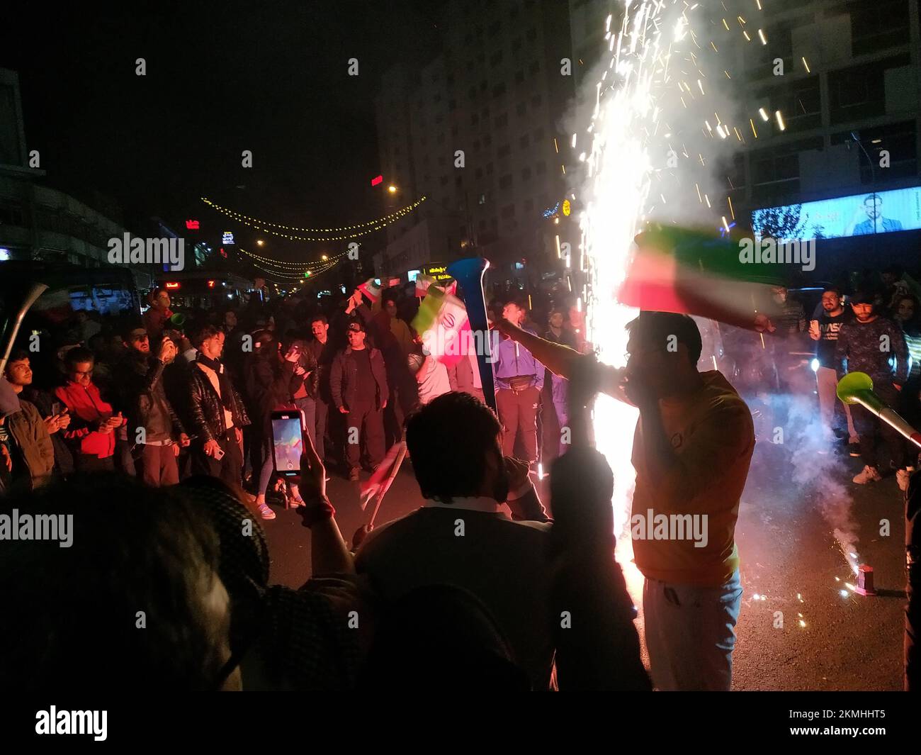 Tehran, Tehran, Iran. 25th Nov, 2022. Iranians celebrate their national soccer team's win against Wales. Iran won 2-0 against Wales during the FIFA 2022 World Cup in Qatar. Iran struck twice in the dying moments of added time to earn a 2-0 win over 10-man Wales in their Group B clash at the World Cup today. Rouzbeh Cheshmi and Ramin Rezaeian scored to give Iran a famous win, which moved them into second place in the group behind England, who face the USA later in the day. (Credit Image: © Stringer via ZUMA Press Wire) Stock Photo