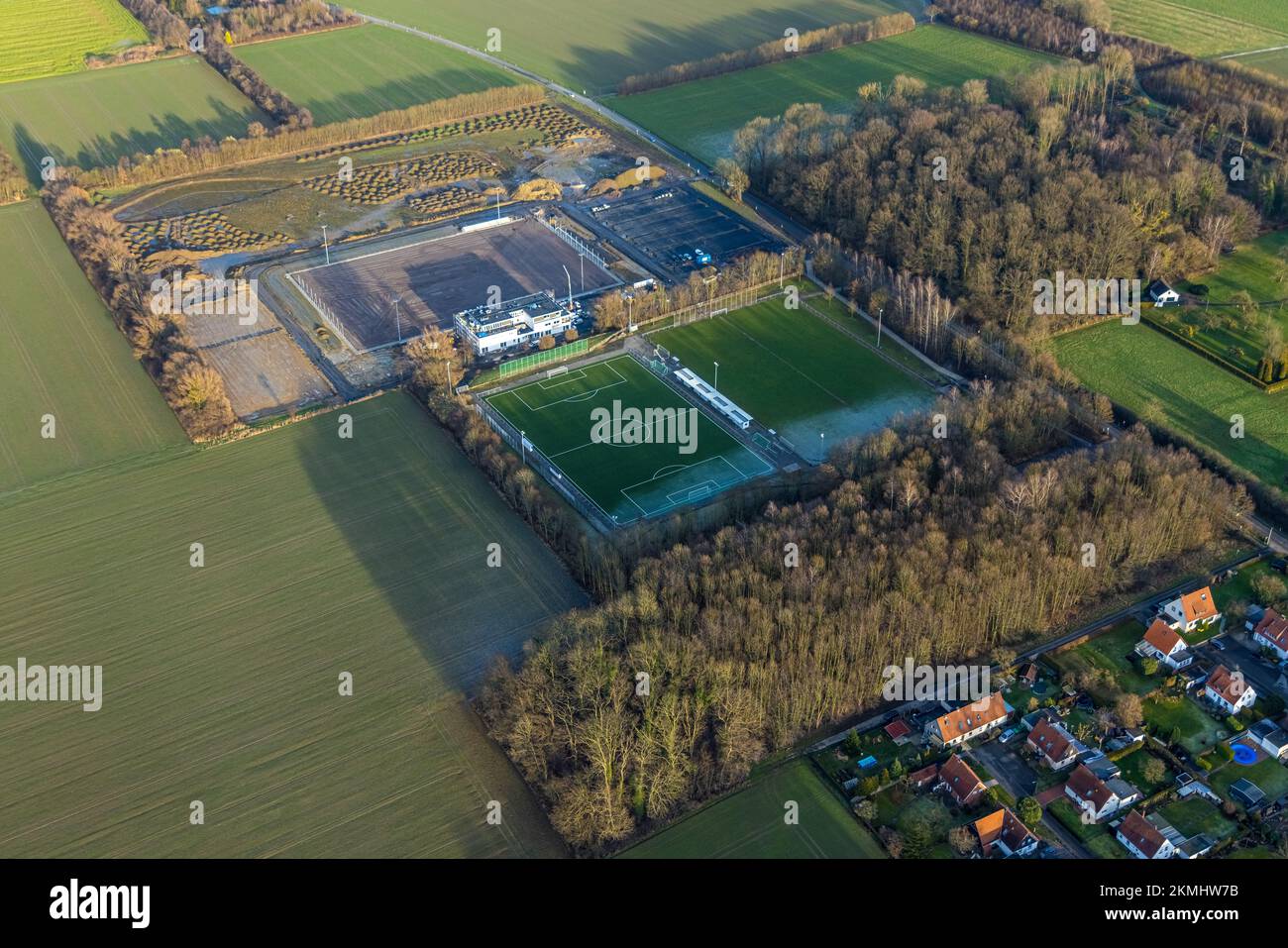 Aerial view, construction site with new sports field and stands and a club building with sports day care center Papenloh An der Lohschule in the distr Stock Photo
