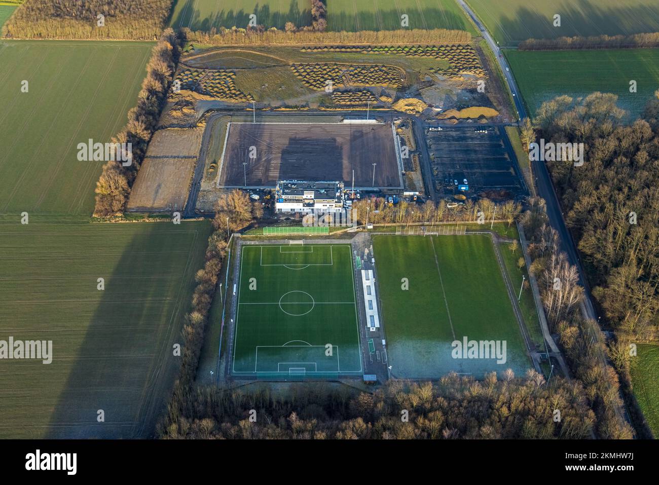 Aerial view, construction site with new sports field and stands and a club building with sports day care center Papenloh An der Lohschule in the distr Stock Photo