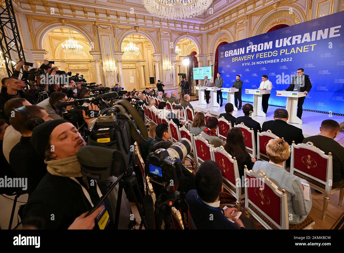 Kyiv, Ukraine. 26 November, 2022. Ukrainian President Volodymyr Zelenskyy, center, listens to a question from the media during the press conference at the conclusion of the inaugural International Summit of Food Security at the Mariinsky Palace, November 26, 2022 in Kyiv, Ukraine. Standing from left to right: Lithuanian Prime Minister Ingrida Simonyte, Belgian Prime Minister Alexander De Croo, Ukrainian President Volodymyr Zelenskyy, Hungarian Prime Minister Katalin Novak, and Polish Prime Minister Mateusz Morawiecki. Credit: Ukraine Presidency/Ukrainian Presidential Press Office/Alamy Live Ne Stock Photo