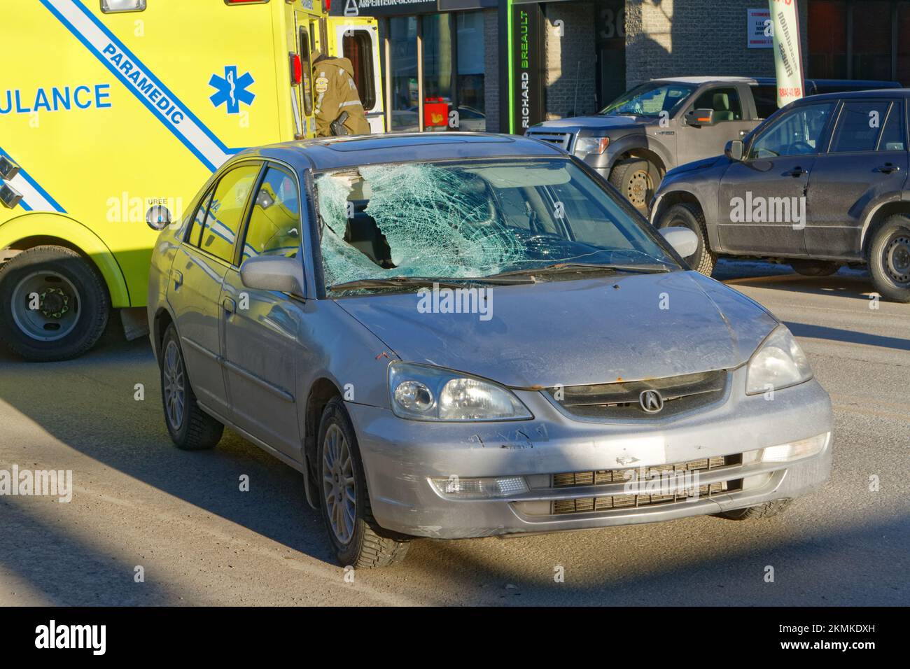 Car damaged after hitting a pedestrian. Quebec,Canada Stock Photo