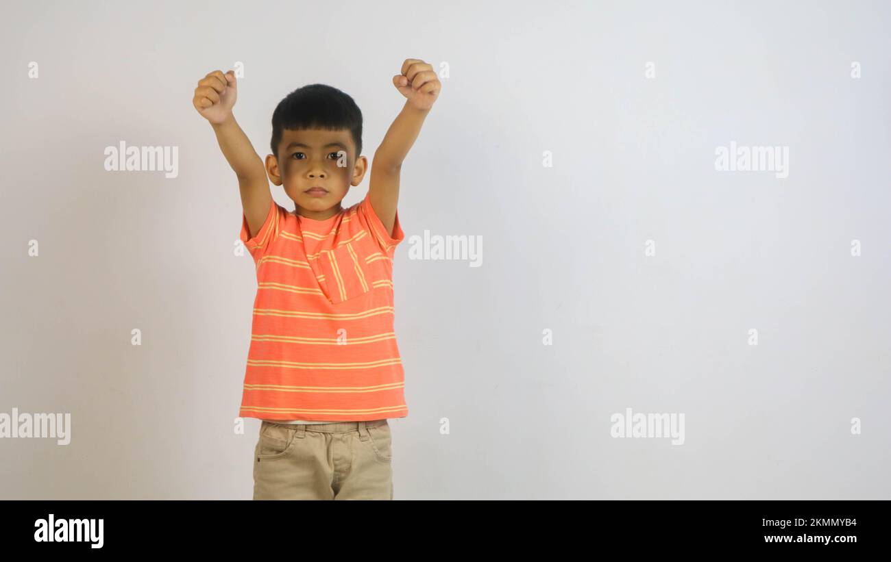 Cute Asian boy isolated on white background Stock Photo - Alamy