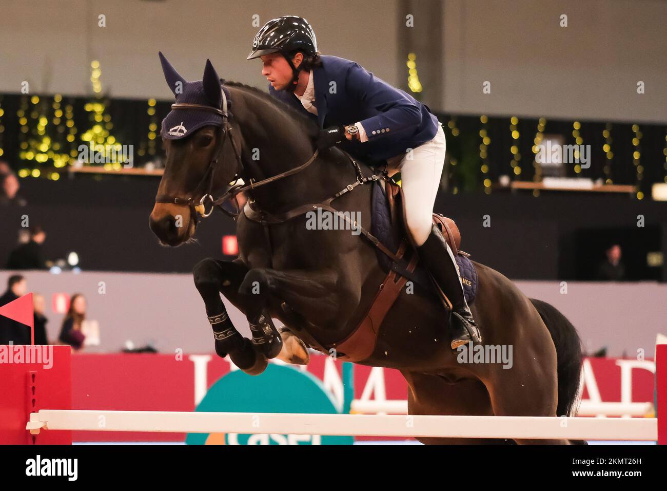 Madrid, Spain. 26th Nov, 2022. Horse rider Martin Fuchs competes during the 'CSI5 Trofeo Estrella Damm' event during the IFEMA Madrid Horse week 2022 at the Main Arena in Ifema, Madrid. IFEMA Madrid Horse week is a multidisciplinary equestrian event which involves competitions and show programs. This holiday of horses and riders is held annually from November 25th to 27th and this year they celebrate their 10th anniversary. IFEMA is short for Institución Ferial de Madrid or 'Fair Institution of Madrid' Credit: SOPA Images Limited/Alamy Live News Stock Photo
