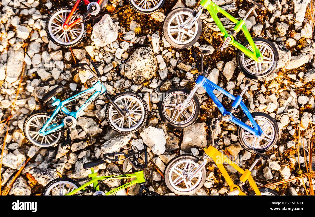 Modern stilllife photography on a setting of finger bikes on stone