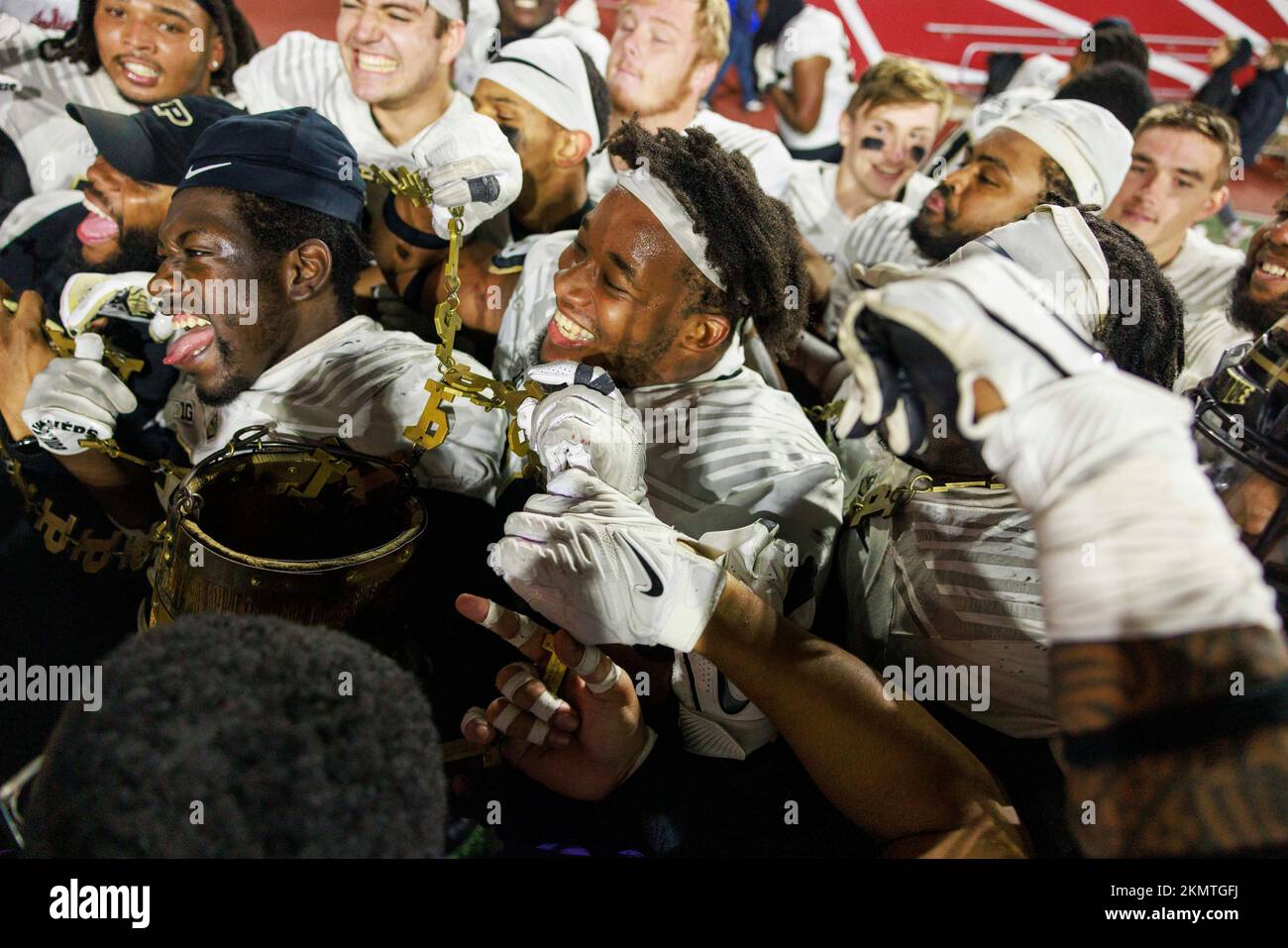 The Purdue Boilermakers celebrate beating Indiana University and taking