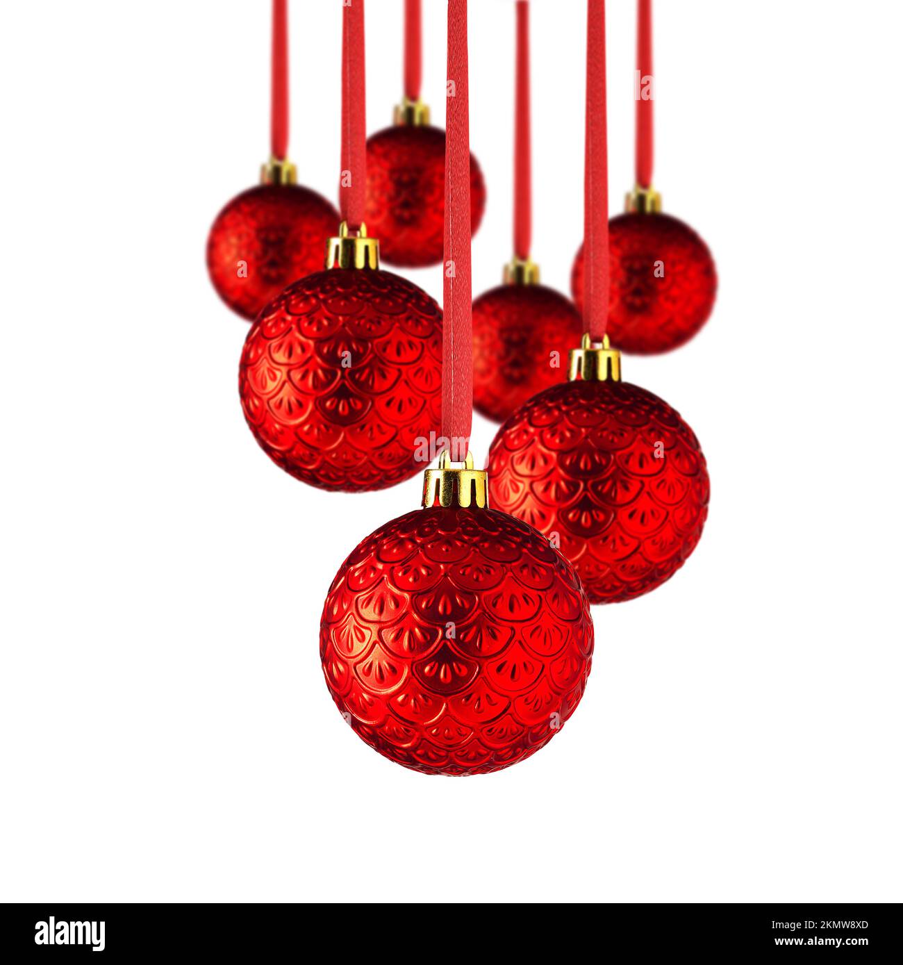 Set of Red Christmas ornaments hanging over white background. Christmas tree decorations