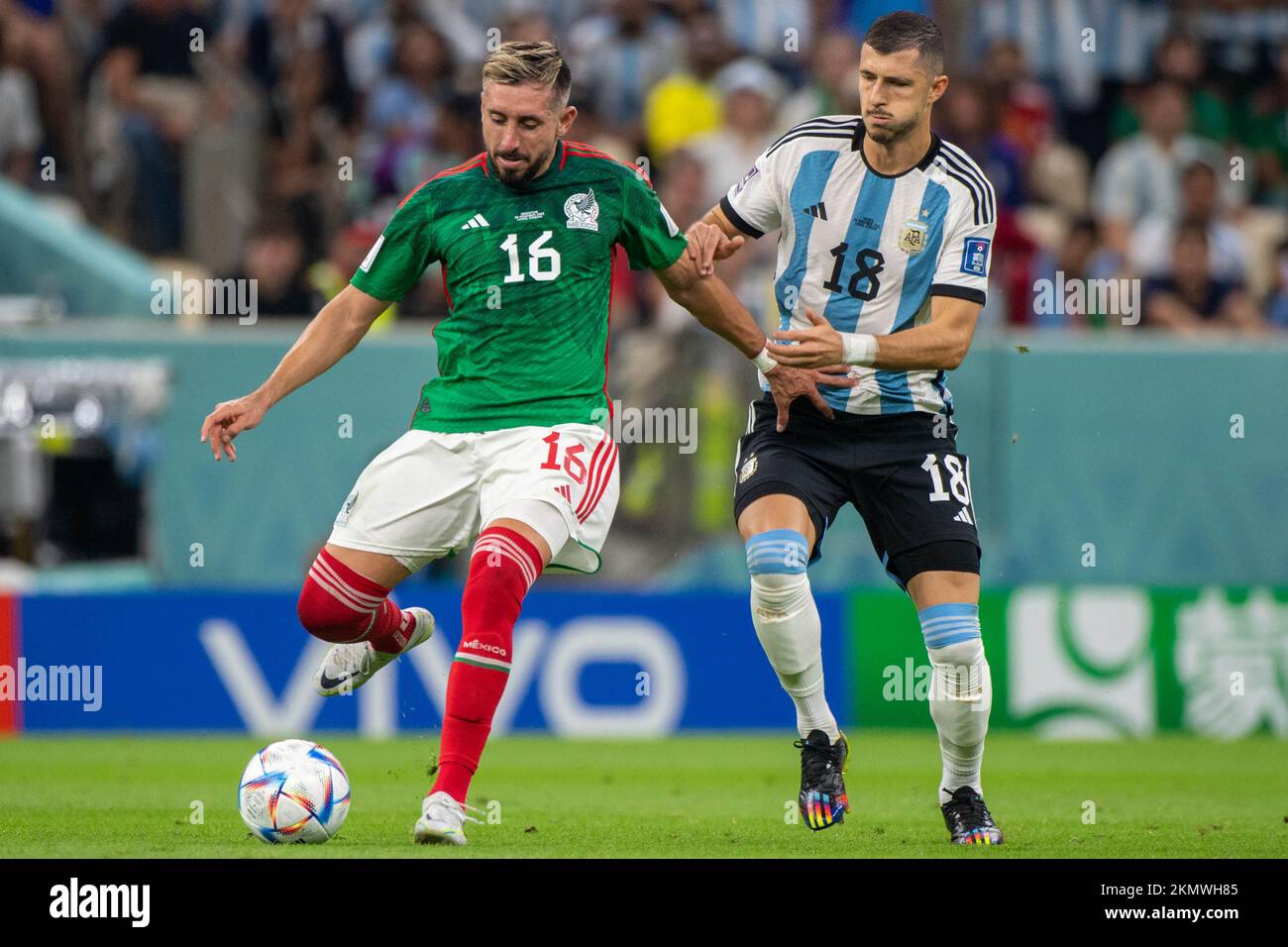 Lusail, Qatar. 27th Nov, 2022. Hector Herrera of Mexico and Thiago Almada of Argentina during the FIFA World Cup Qatar 2022 Group C match between Argentina and Mexico at Lusail Stadium in Lusail, Qatar on November 26, 2022 (Photo by Andrew Surma/ Credit: Sipa USA/Alamy Live News Stock Photo