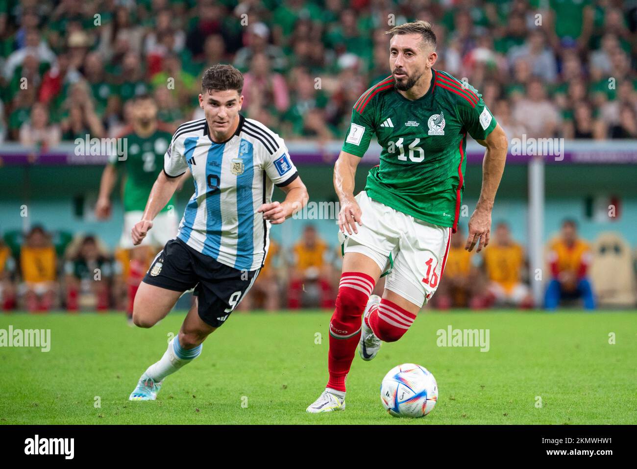 Lusail, Qatar. 27th Nov, 2022. Julian Alvarez of Argentina and Hector Herrera of Mexico during the FIFA World Cup Qatar 2022 Group C match between Argentina and Mexico at Lusail Stadium in Lusail, Qatar on November 26, 2022 (Photo by Andrew Surma/ Credit: Sipa USA/Alamy Live News Stock Photo