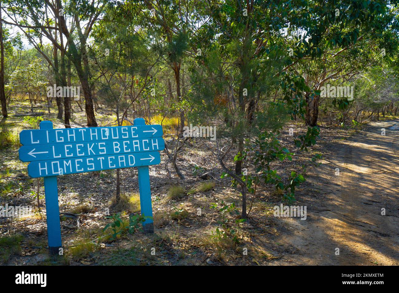 Blue signpost on cross island walking track Great Keppel Island, Capricorn Coast, Queensland, Australia Stock Photo